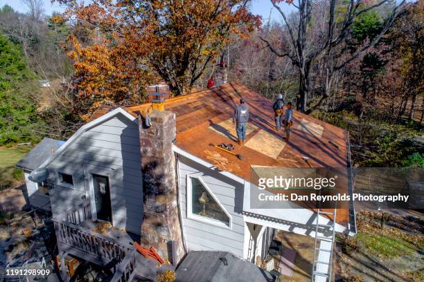 roof construction - replacement stock pictures, royalty-free photos & images