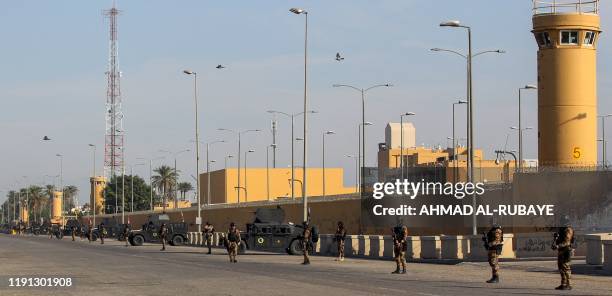 Iraqi counter-terrorism forces stand guard in front of the US embassy in the capital Baghdad on January 2, 2020. The US embassy siege by pro-Iran...