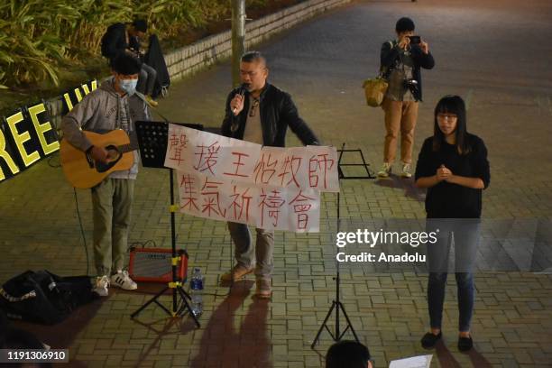 Band performs as Members of Good Neighbourhood North District Church protest against the jailing of Chinese Christian Pastor Wang Yi for nine years...