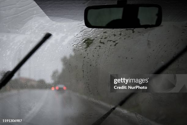 View inside a car on rainy day on January 2, 2020 in Chania, Greece.