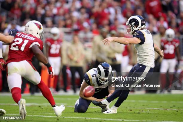 Kicker Greg Zuerlein of the Los Angeles Rams kicks a 27 yard field goal against the Arizona Cardinals during the first half of the NFL game at State...
