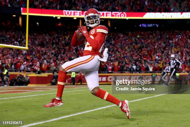 Juan Thornhill of the Kansas City Chiefs scores a touchdown after intercepting a ball intended for Tyrell Williams of the Oakland Raiders during the...
