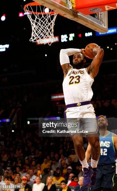 LeBron James of the Los Angeles Lakers dunks the ball during the second half against the Dallas Mavericks at Staples Center on December 01, 2019 in...