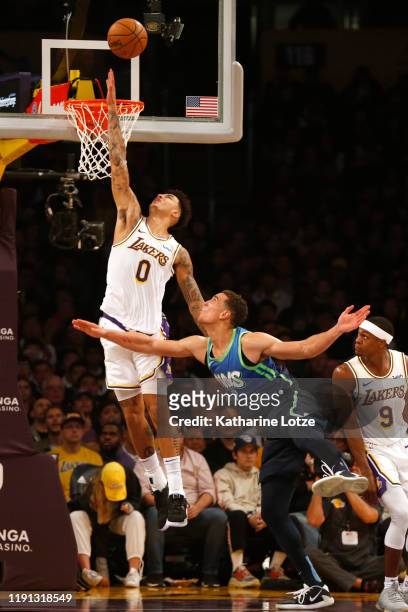 Kyle Kuzma of the Los Angeles Lakers blocks a shot by Dwight Powell of the Dallas Mavericks during the second half at Staples Center on December 01,...