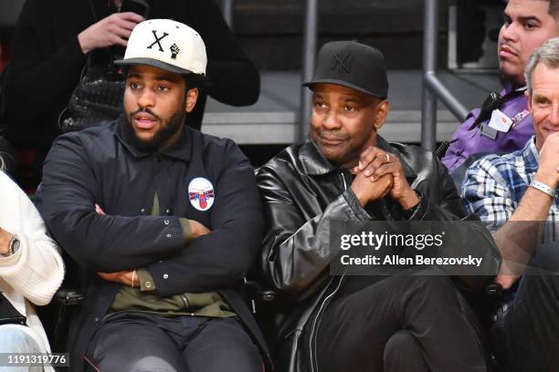 Malcolm Washington and Denzel Washington attend a basketball game between the Los Angeles Lakers and the Dallas Mavericks at Staples Center on...