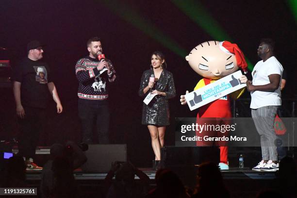 Jaime Ferreira, Intern John, Rose and EJ of 93.3 FLZ speak with Stewie from Family Guy onstage during 93.3 FLZ's Jingle Ball 2019 Presented by...