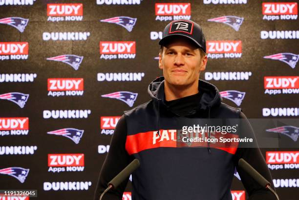 New England Patriots quarterback Tom Brady smiles during press conferences in advance of the AFC Wild Card Game between the New England Patriots and...