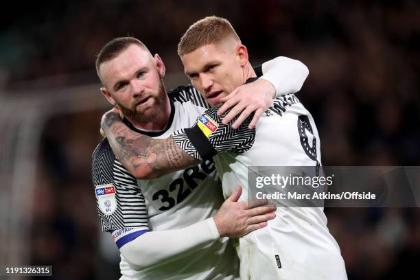 Wayne Rooney and Martyn Waghorn of Derby County celebrate the 2nd goal during the Sky Bet Championship match between Derby County and Barnsley at...