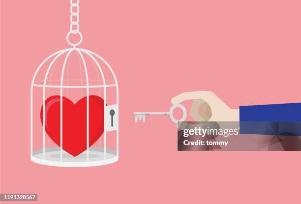 man uses a key unlock heart from a cage - frustration stock illustrations