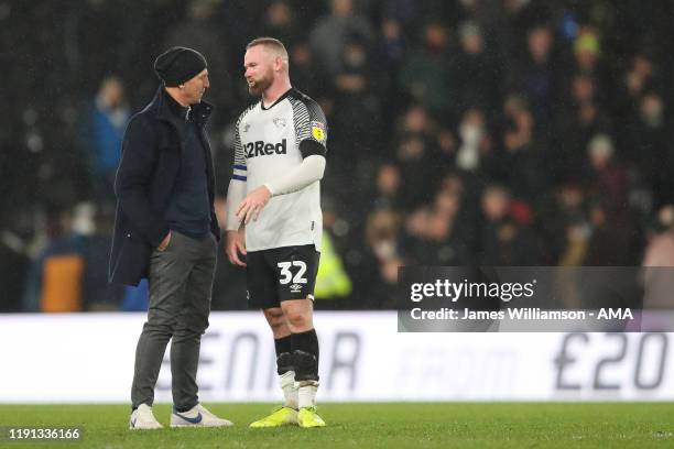 Barnsley manager / head coach Gerhard Struber and Wayne Rooney of Derby County during the Sky Bet Championship match between Derby County and...