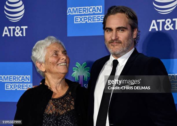 Actor Joaquin Phoenix and his mother Arlyn Phoenix arrive for the 31st Annual Palm Springs International Film Festival Awards Gala at the Convention...
