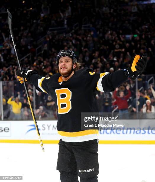 David Pastrnak of the Boston Bruins celebrates after scoring a goal against the Montreal Canadiens during the third period at TD Garden on December...