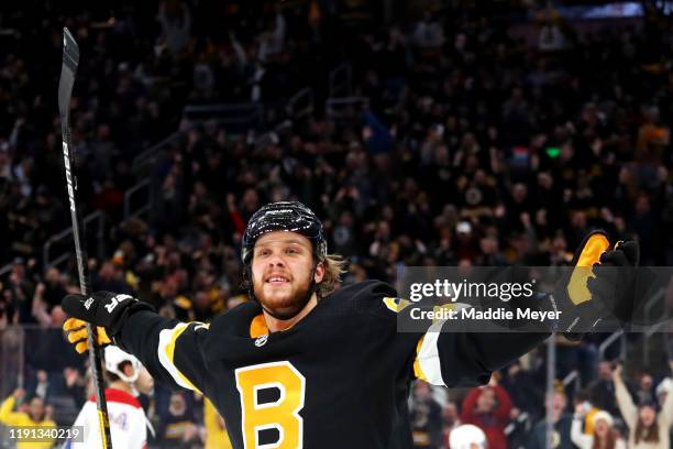 David Pastrnak of the Boston Bruins celebrates after scoring a goal against the Montreal Canadiens during the third period at TD Garden on December...