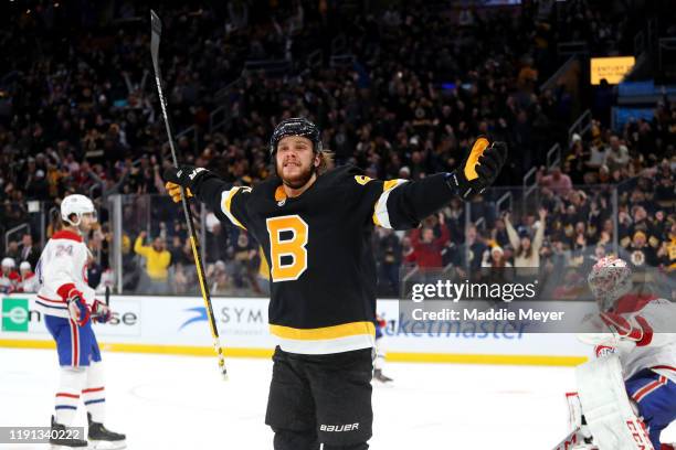 David Pastrnak of the Boston Bruins celebrates after scoring a goal against the Montreal Canadiens during the third period at TD Garden on December...