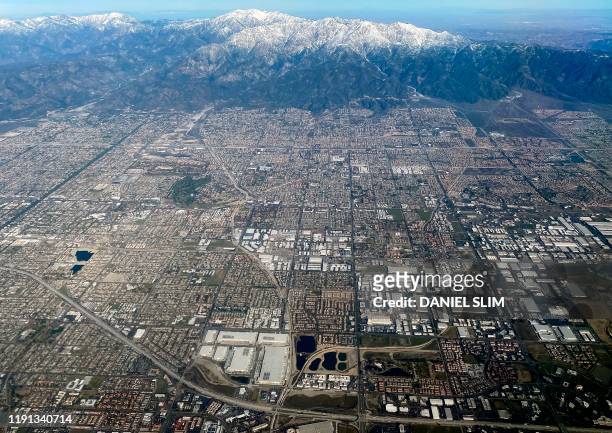 This aerial view shows the San Gabriel Mountains covered in snow near Ontario, California, on January 2, 2020.