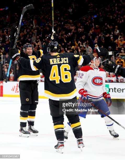 David Backes of the Boston Bruins celebrates with David Krejci after scoring a goal against the Montreal Canadiens during the third period at TD...