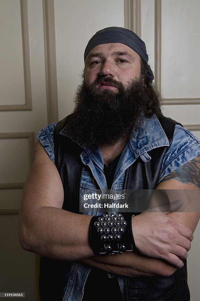 A bouncer standing in front of a door