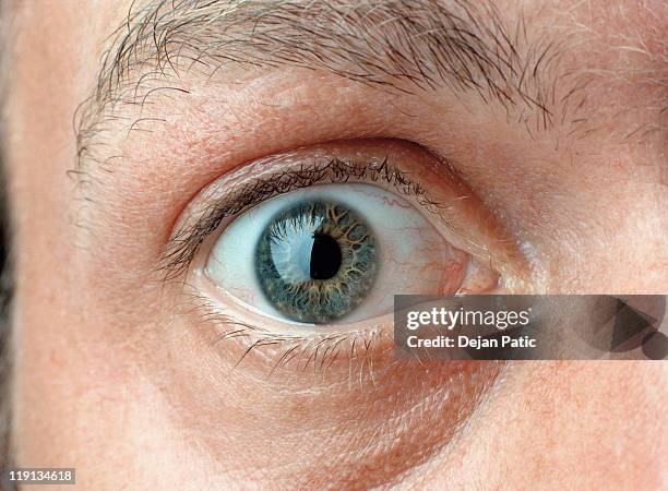 close-up of a man's eye - eye open stockfoto's en -beelden