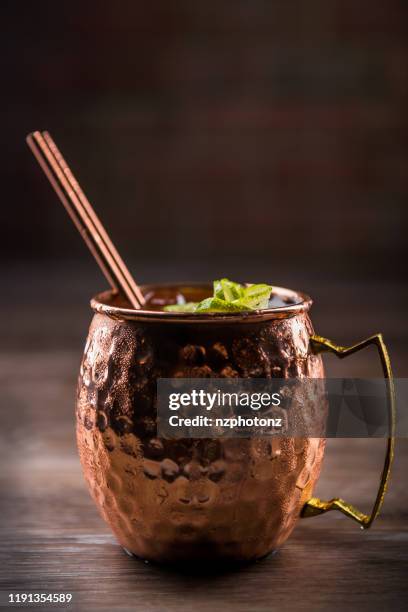 moscow mule in a copper mug (click for more) - moscow mule isolated stock pictures, royalty-free photos & images