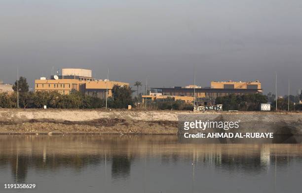 General view shows the US embassy across the Tigris river in Iraq's capital Baghdad on January 3, 2020. The US embassy in Baghdad urged American...