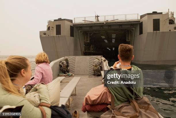 Evacuees from Mallacoota are transported to HMAS Choules in Victoria, Australia on January 3, 2020. The Australian Defence Force commenced has...