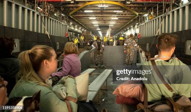 Evacuees from Mallacoota arrive in HMAS Choules in Victoria, Australia on January 3, 2020. The Australian Defence Force commenced has commenced...