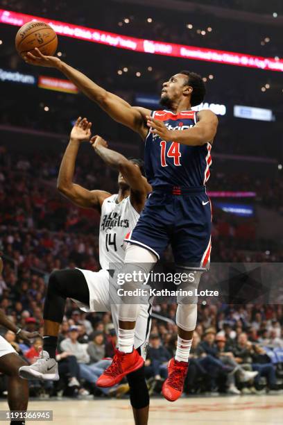 Ish Smith of the Washington Wizards goes up for a shot as Terance Mann of the Los Angeles Clippers defends during the first half at Staples Center on...