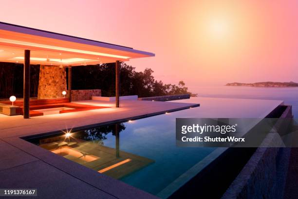 island villa - luxury stock pictures, royalty-free photos & images