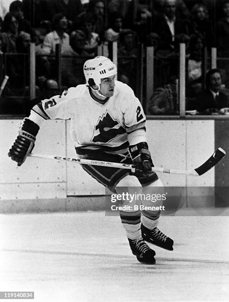 Joel Quenneville of the Colorado Rockies skates on the ice during an NHL game during the 1980 season at the McNichols Sports Arena in Denver,...