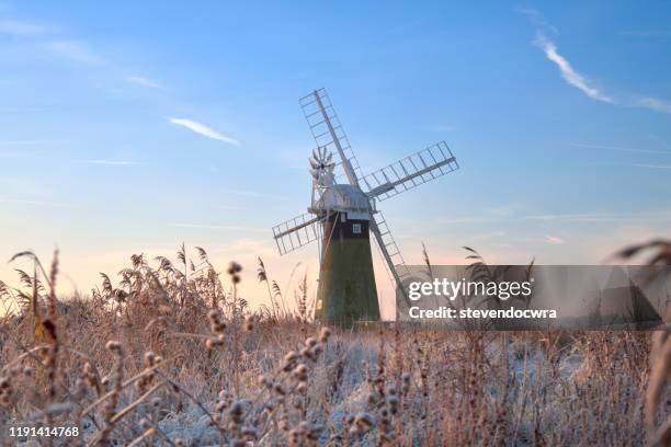 st benet's level windmill on a cold and frosty december morning - norfolk broads stock pictures, royalty-free photos & images