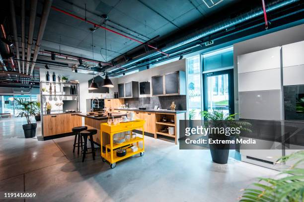 a modern interior kitchen design set up in a home improvement store - furniture store stock pictures, royalty-free photos & images