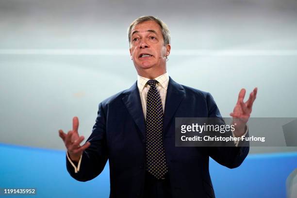 Brexit party leader Nigel Farage addresses supporters at a Brexit party campaign event in Buckley on December 02, 2019 in Buckley, Wales. Political...