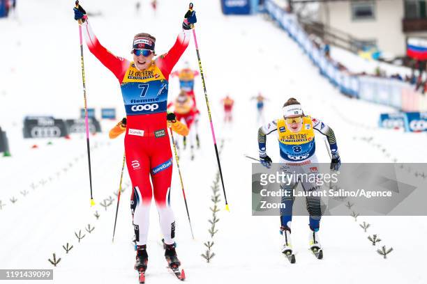 Astrid Uhrenholdt Jacobsen of Norway takes 1st place, Ebba Andersson takes 2nd place during the FIS Nordic World Cup Men's and Women's Cross Country...