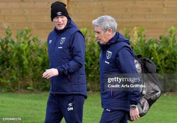 David Moyes and Alan Irvine of West Ham United during training at Rush Green on January 3, 2020 in Romford, England.