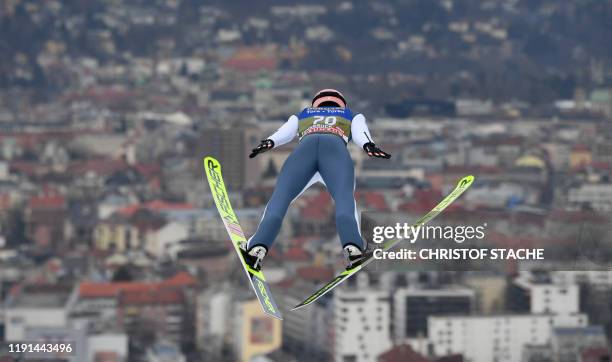 Austria's Stefan Kraft soars through the air during his second training jump at the Four-Hills Ski Jumping tournament in Garmisch-Partenkirchen,...