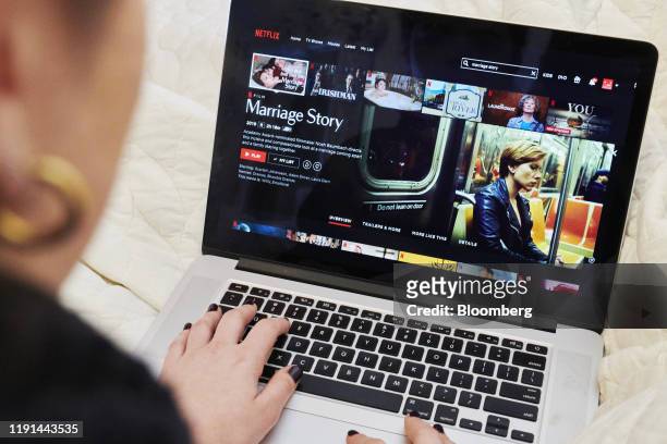 The home screen for the Netflix Inc. Original movie "Marriage Story" is displayed on an Apple Inc. Laptop computer in an arranged photograph taken in...