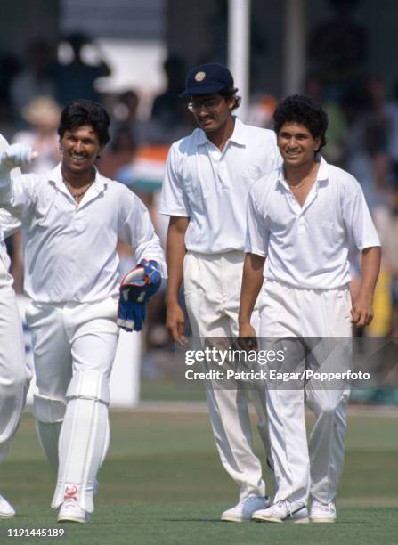 Kiran More , Anil Kumble and Sachin Tendulkar of India celebrate after England batsman David Gower is run out for 25 runs in the 2nd Texaco Trophy...