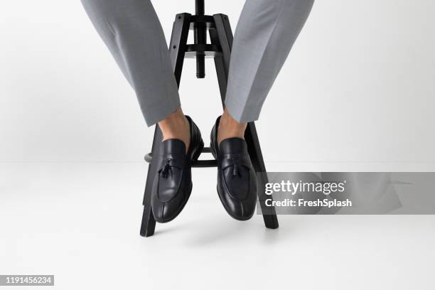 a man wearing loafers - mens loafers stock pictures, royalty-free photos & images