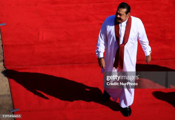 Sri Lankan prime minister Mahinda Rajapaksa arrives at the ceremonial inauguration of the fourth session of the Eighth Parliament in Colombo, Sri...