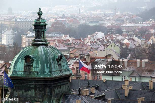 Seat of the Czech government with EU and Czech flags pictured in Prague, Czech Republic on January 3, 2020. Lesser Town of Prague pictured at the...