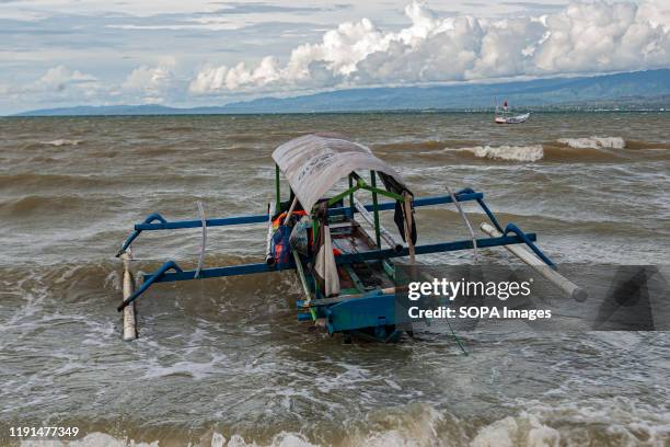 Fishing boat anchored on the shoreline. High waves in the waters of Palu Bay forced Hundreds of fishermen in the village of Lere to anchor their...