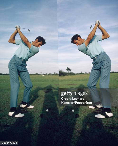 Bob Charles, New Zealand left-handed golfer and national sporting hero, uses a mirror during a practice session, circa 1970.