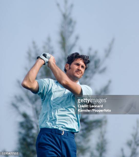 Bob Charles, New Zealand left-handed golfer and national sporting hero, tees off, circa 1971.