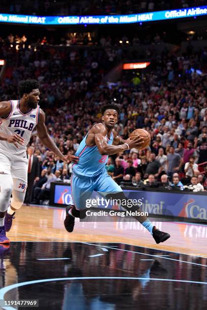 Miami Heat Jimmy Butler in action vs Philadelphia 76ers Joel Embiid at American Airlines Arena. Miami, FL CREDIT: Greg Nelson