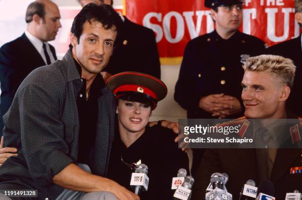 Portrait of American actor and director Sylvester Stallone, Danish actress Brigitte Nielsen, and Swedish actor Dolph Lundgren during the filming of...