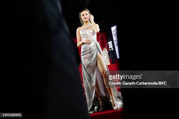 Niomi Smart arrive at The Fashion Awards 2019 held at Royal Albert Hall on December 02, 2019 in London, England.
