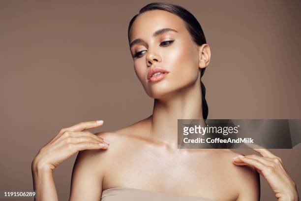 gorgeous woman posing on camera - most beautiful female body stock pictures, royalty-free photos & images