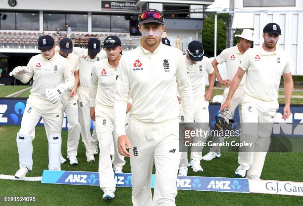 England captain Joe Root leads out his team ahead of day 5 of the second Test match between New Zealand and England at Seddon Park on December 03,...