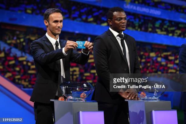 Ricardo Carvalho and Marcel Desailly attend the UEFA Euro 2020 Final Draw Ceremony on November 30, 2019 in Bucharest, Romania.
