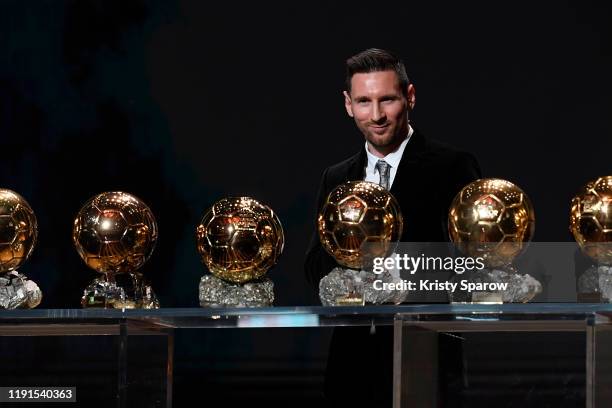 Lionel Messi poses onstage with after winning his sixth Ballon D'Or award during the Ballon D'Or Ceremony at Theatre Du Chatelet on December 02, 2019...